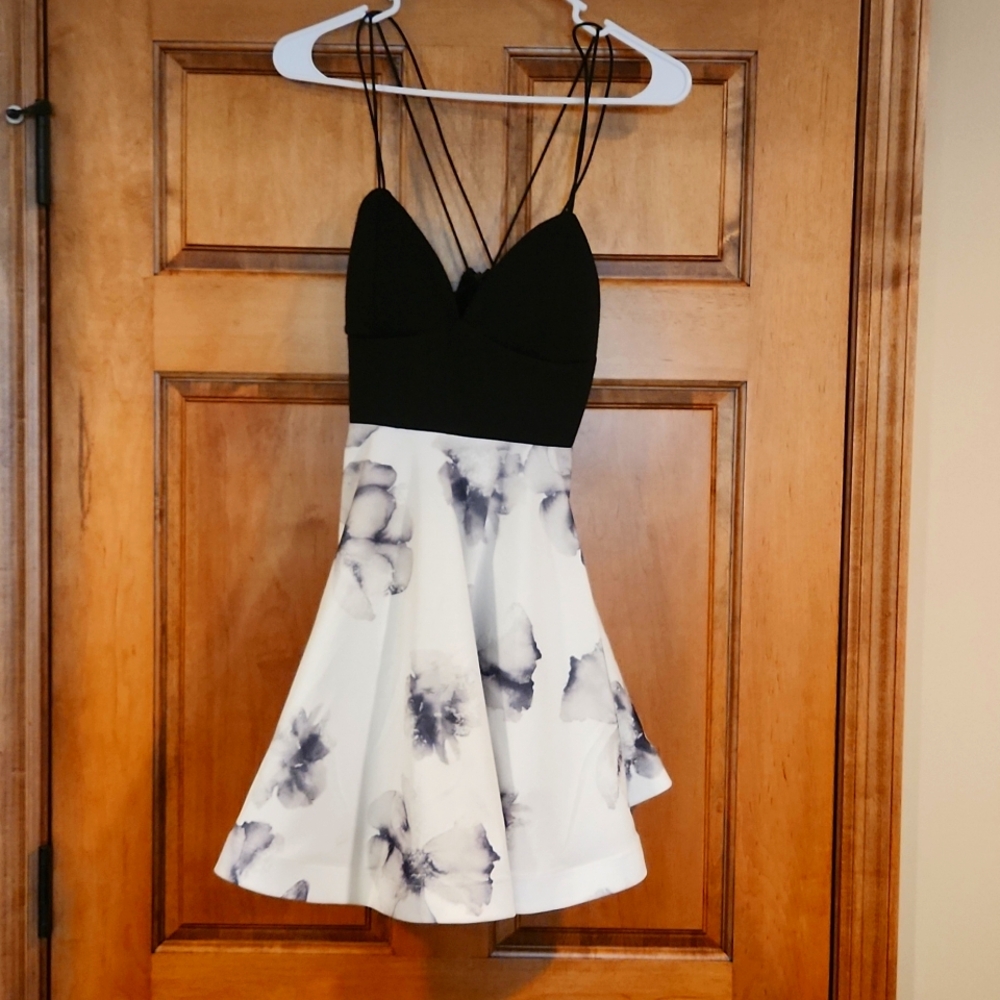 Black and white floral spaghetti trap formal dress by L'ATISTE